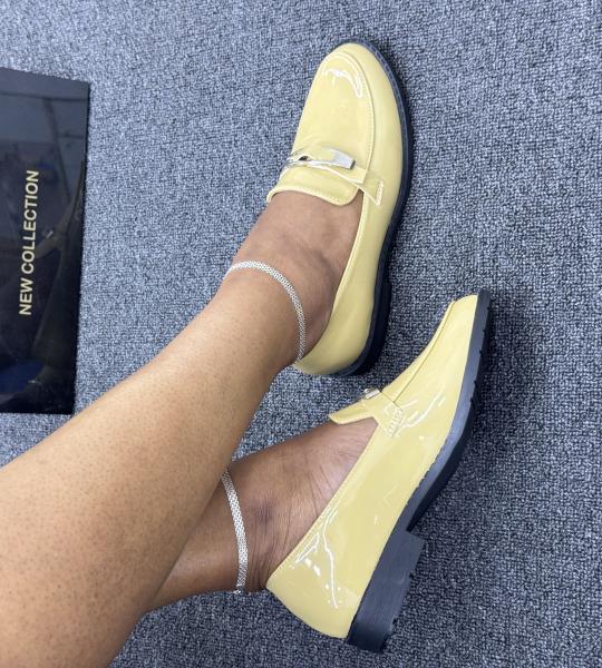 Bold glossy loafers